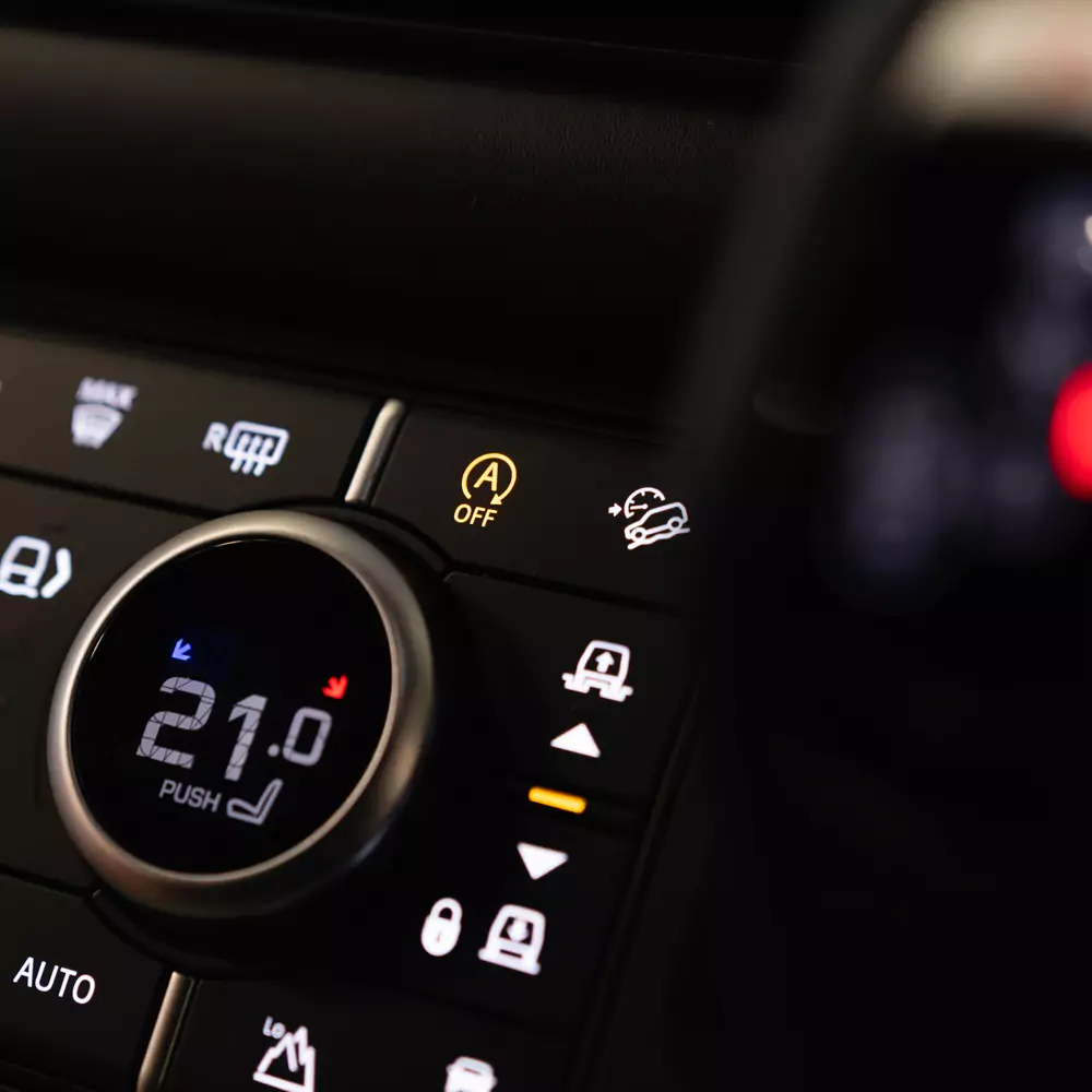 configurable start stop button illuminated on land rover dashboard